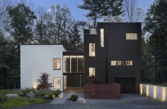 ClusterOne is a stucco clad celestially inspired home in the Hudson Valley