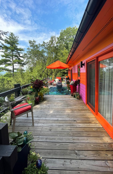 The original rear deck at Woodland Pop House was small and cramped, even while our clients infused it with their love of color.