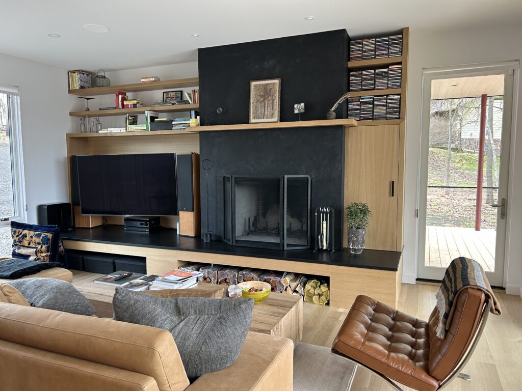 Finished indoor living area at Vannstrom, a completed Hudson Valley home with white oak millwork and dark accents.