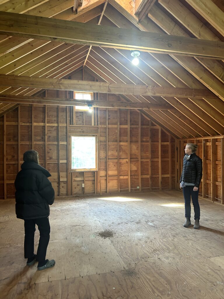 Interior of existing barn structure at Red Barn Reno during early schematic design exploration, assessing spatial opportunities for the office conversion.