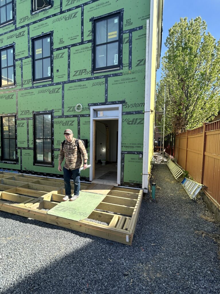 Exterior desck framing in progress at Hudson House, a modern townhouse renovation in Hudson New York.