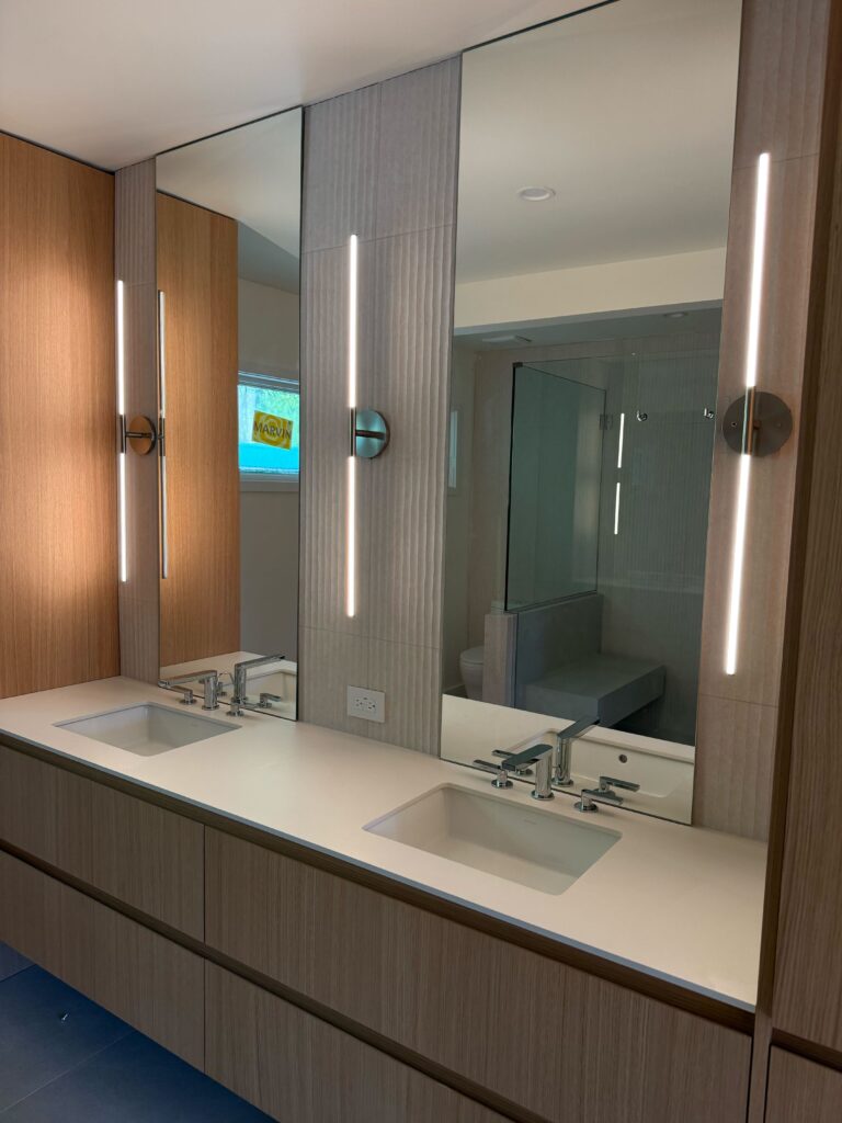 Detail of completed millwork installation at Olivebridge Reno, showing the refined craftsmanship of the built-ins and cabinetry throughout the home.