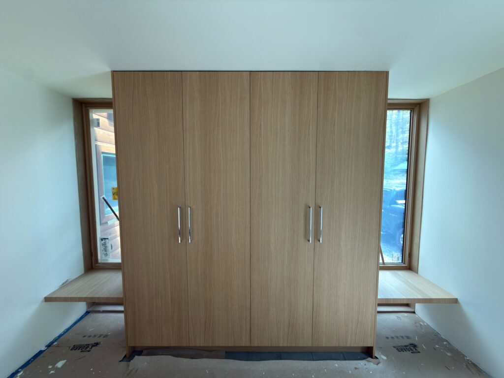 Finished mudroom at Olivebridge Reno capturing the warmth and quality of the completed renovation as clients settle back into their home.